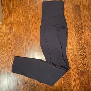 Navy Lululemon leggings in size 2 with mesh detailing